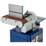 The belt sander in the horizontal position with the fence at zero degrees