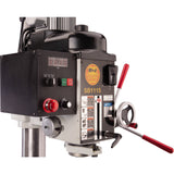 The head features fine downfeed control, a forward/reverse spindle switch, 3-phase variable speed, and a digital spindle speed readout.