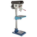 The left side of the SB1125 19-1/2" Floor Drill Press featuring the control panel with digital readout, motor, and table lock handles.